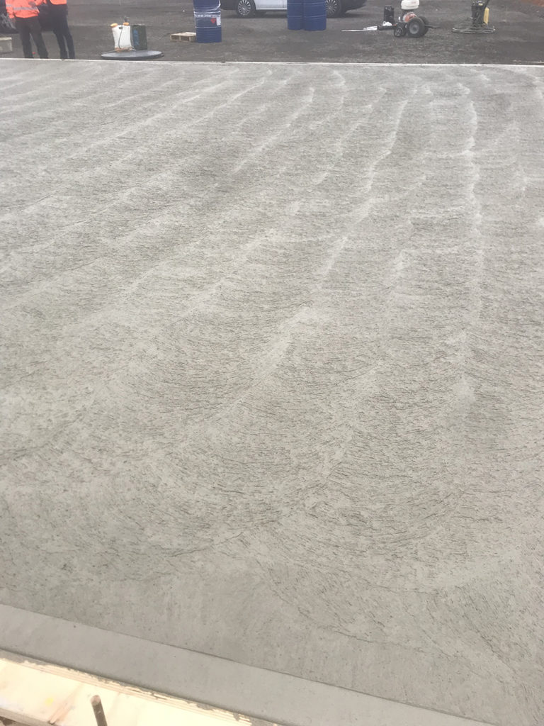 Rough pan surface finish created with Powerfloats to provide a long