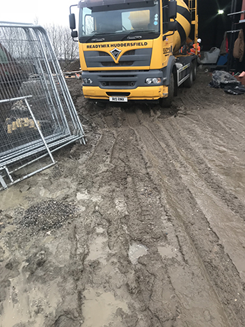 2. The steel fibre reinforced concrete is then driven in the truckmixer to the workface and discharged into buggies onto the working platform
