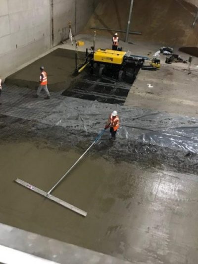 Ligchine laser screed concrete laying and compacting machine in use with Level Best Concrete Flooring team in Yorkshire.