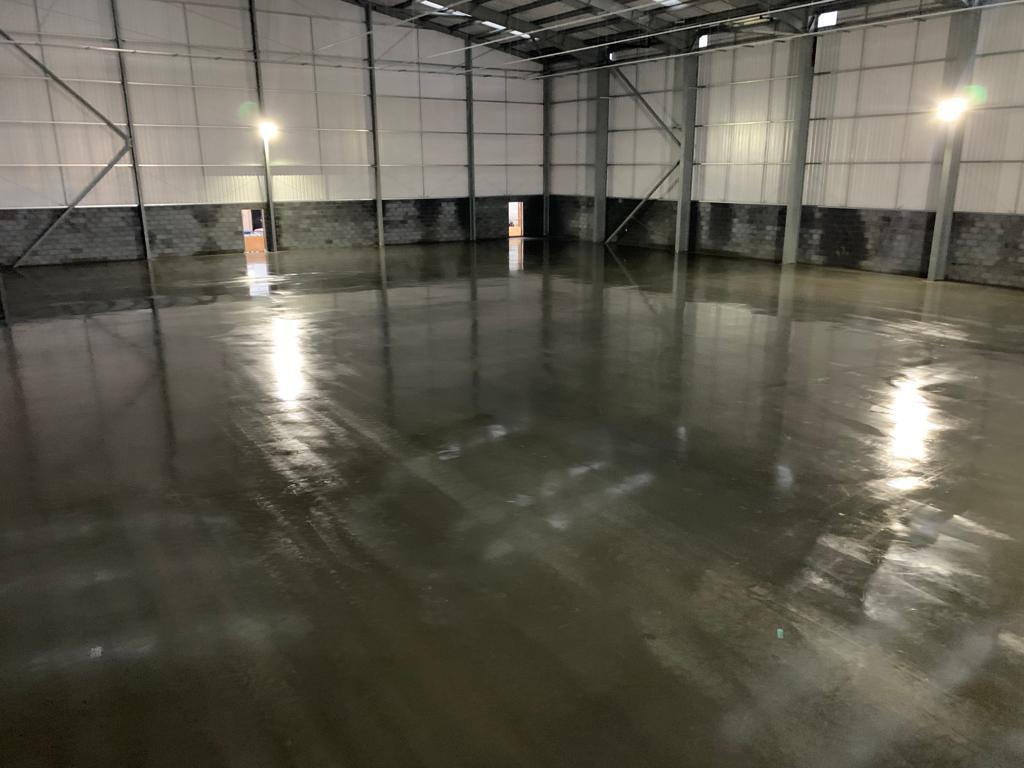 Design and build warehouse concrete flooring in Staples Corner, London